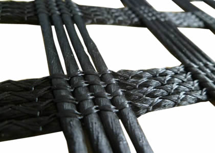 There is a piece of polyester geogrid. It consists of four strands of polyester fibers.