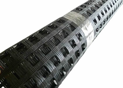 There is a coil of polyester geogrid. It is tied with a tape.