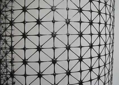 There is a piece of quadrangular triaxial geogrid.